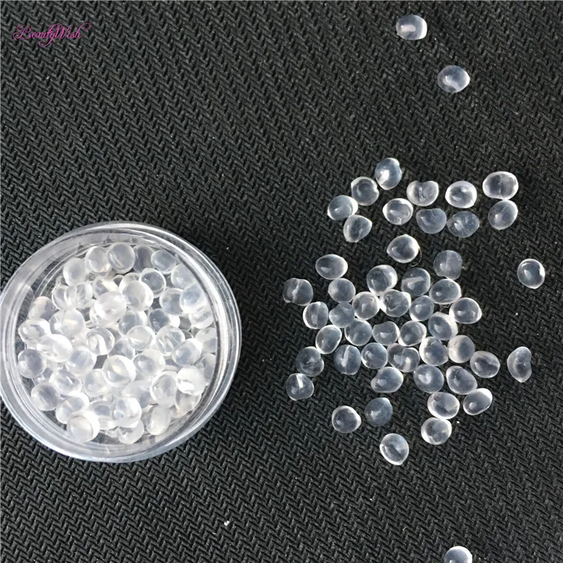 

100g Clear Yellow Fusion Keratin Glue Rebond Granules Beads - Korean Grade