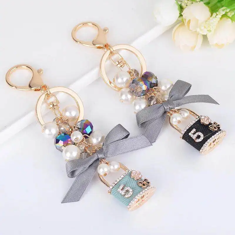 New pearl bow key chain personalized lock crystal ring car chains female bag pendant accessories keychain Дом и сад