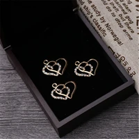 wkoud 10pcs new kc gold hand drill double hearts charm alloy pendants for diy jewelry charm findings a884