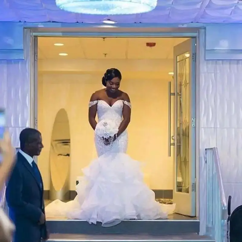 

Sexy Off the Shoulder Mermaid Wedding Dresses Organza Saudi African Lace Appliques Ruffles Bridal Gowns 2019