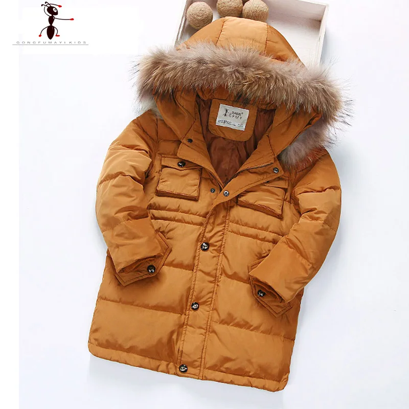 Белый длинный пуховик на утином пуху с капюшоном и мехом для мальчиков детские