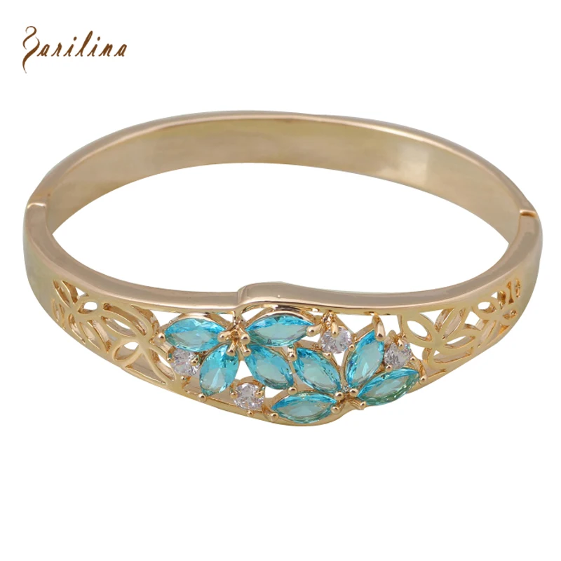 Женский браслет с цветком Garilina золотое небесно голубое фианитом ювелирное