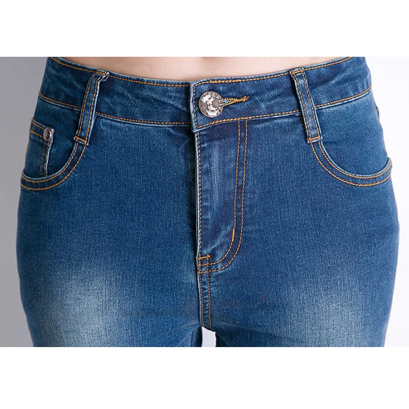 Женские эластичные брюки-клеш ручной работы украшенные бисером синего цвета