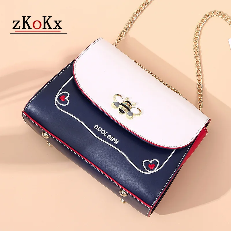 Модная качественная кожаная женская сумка мессенджер на цепочке маленькая через