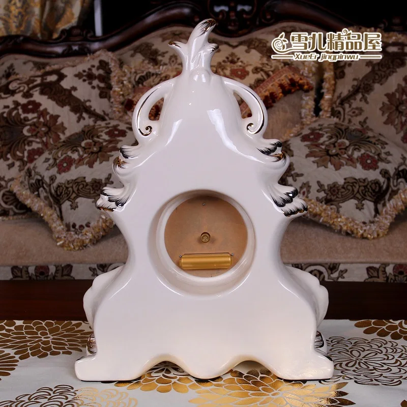 

European table clock creative personality ceramic gold watch. Sitting room decoration Ivory porcelain ornaments