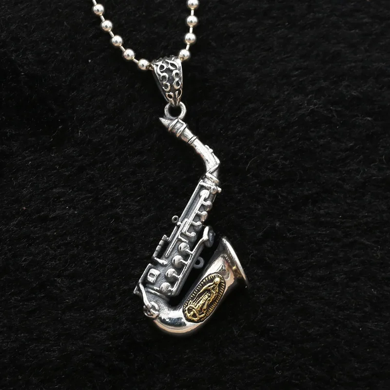 

Factory Wholesale S925 Sterling Silver Jewelry Creative Inlaid With The Virgin Mary Saxophone Musical Instrument Pendant