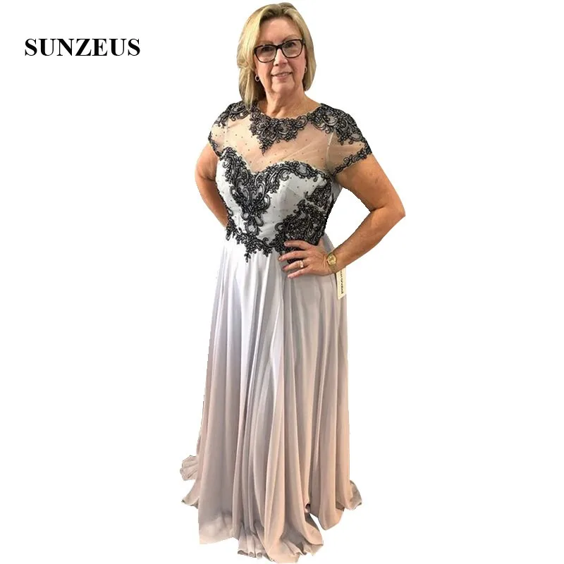 

Длинное шифоновое платье для матери невесты с черной аппликацией трапециевидной формы с рукавами-крылышками; женские свадебные вечерние п...