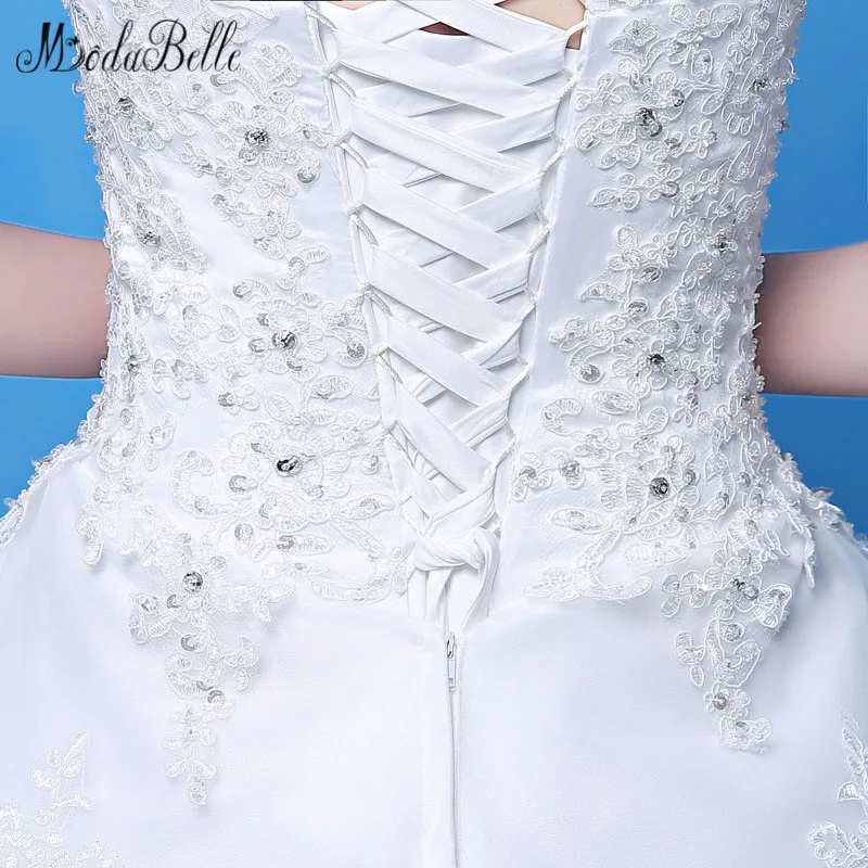 Modabelle 2018 Новые свадебные платья с рукавами лодочкой на шнуровке аппликация