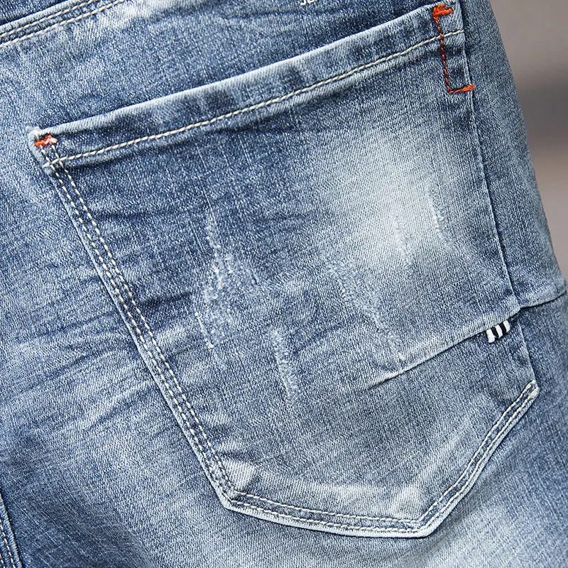 

Men's Short Jeans 2018 Summer Hole Design Male Shorts Jeans Drawstring Zippers Mens Half Length Denim Pants for Mans blue 8033