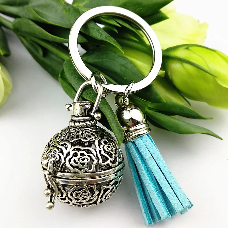 

1PC Delicate rose Aromatherapy Key Chains Perfume Essential Oil Diffuser Cage Locket Key buckle with lava beads Volcanic Rocks