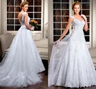 Свадебное платье с открытой спиной, кружевной аппликацией и шлейфом