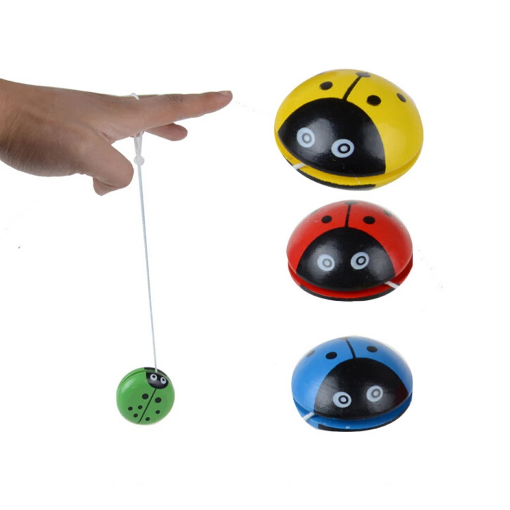 

Four colors ladybird Yo Yo ball Blue green red yellow Ladybug YOYO creative toys wooden Yo Yo toys for children 1PCS