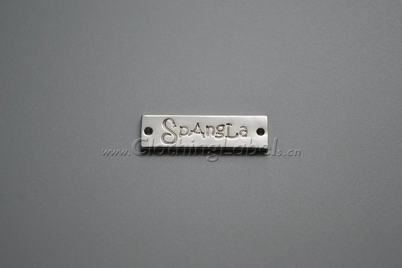

custom matt silver metal label with engraved logo, metal label for clothing.