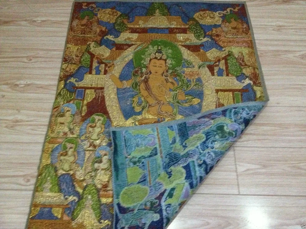 

A golden silk embroidery thangka Tibet and Nepal exorcism peace and wealth