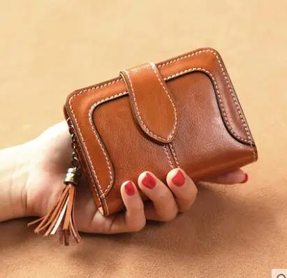

2019 new wallet female short section leather folding leather clip three fold storage bag leather ladies purse