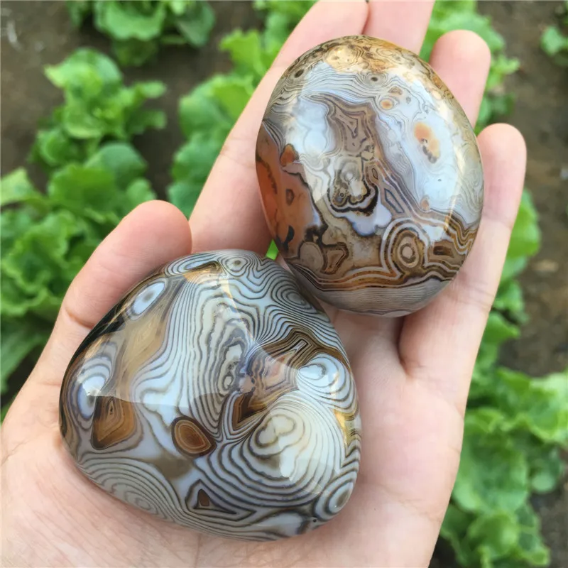 Фотообои! Красивые Натуральные драгоценные камни и минералы sardonyx с ладонью