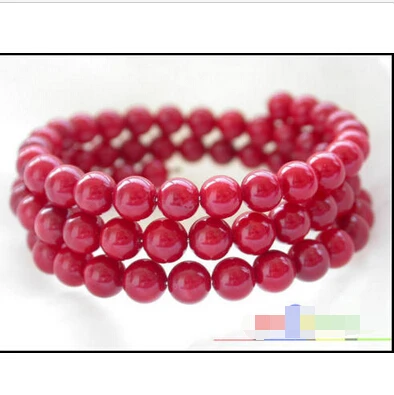 

Extendible 6mm round red coral bead Bracelet e SHIPPING 5.26