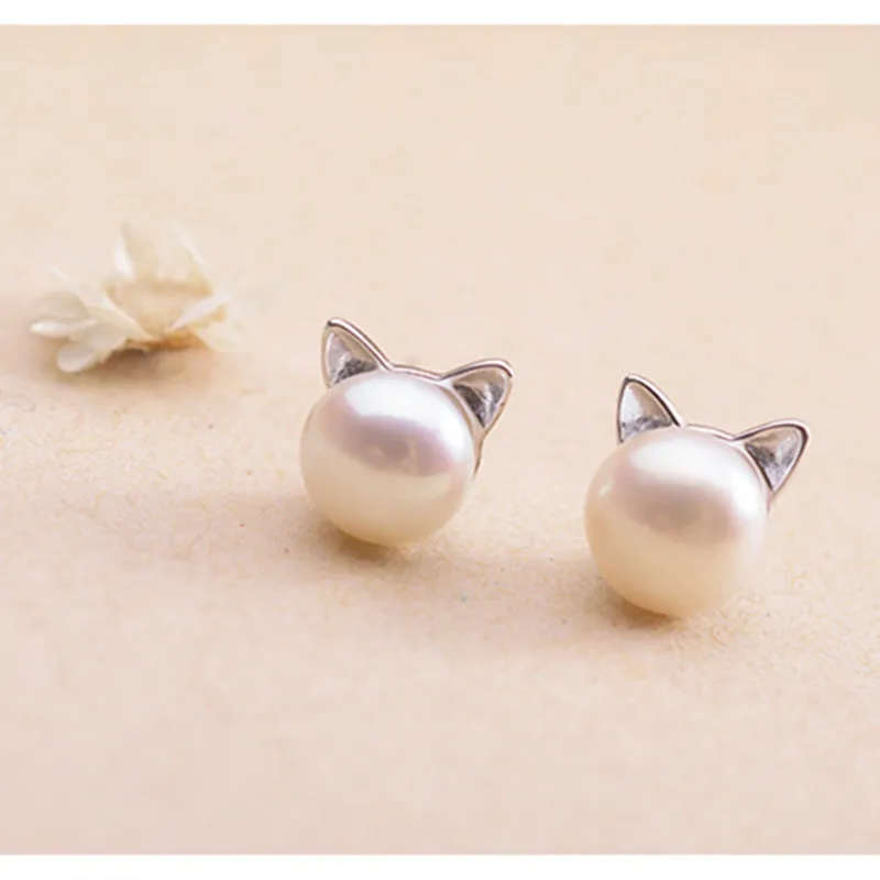 E0166 Fashion Jewelry Simulated Pearl Stud Earrings Sweet Cute Cat Ear Design Stud Earrings For Women Korean Style Wholesale fashion simulated pearl shiny cz zircon butterfly design stud earrings for women wedding party jewelry korean bow pearl ball ear
