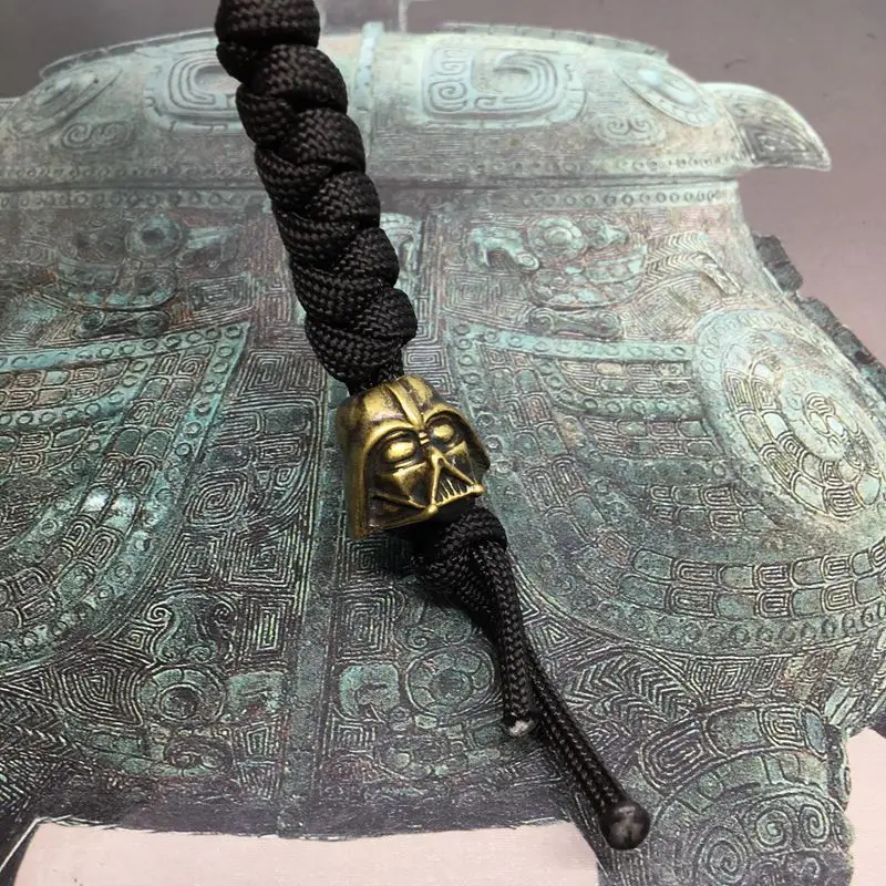 

1PC Brass Star Wars Samurai Helmet Paracord Knife Beads DIY Umbrella Rope Car Key Lanyard Pendant EDC Pocket Play Tools