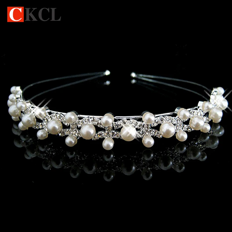 Хрустальная повязка на голову с жемчугом и стразами серебристая Тиара для