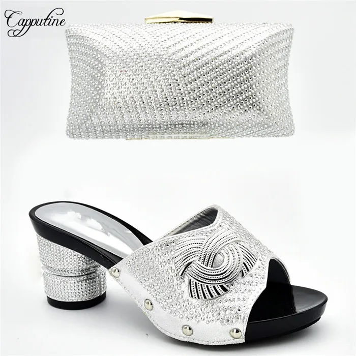 Самые популярные фиолетовые туфли лодочки и сумка в комплекте под вечернее