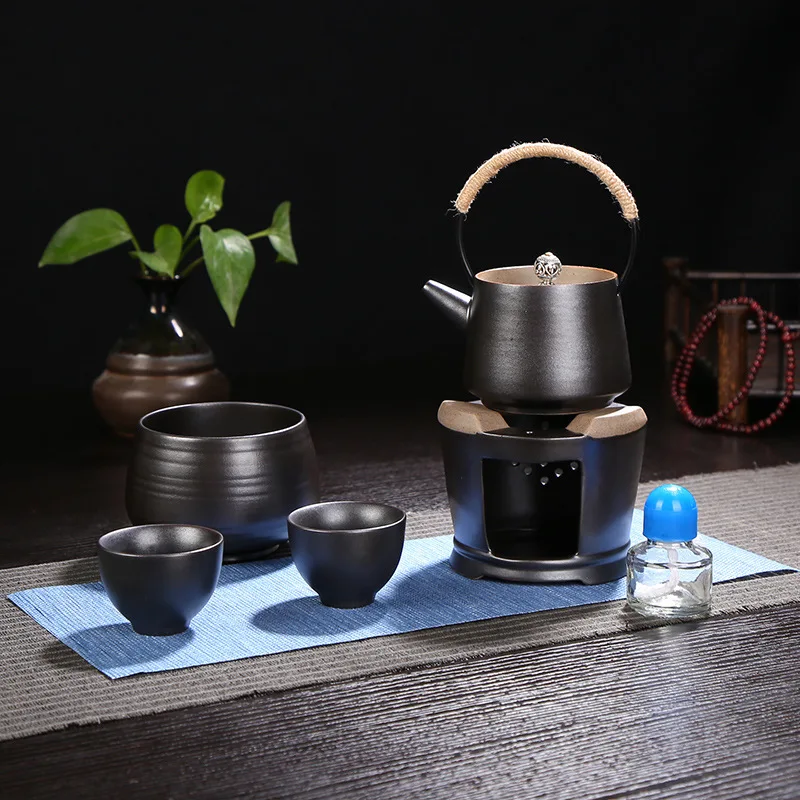 

Taiwan boiled pots boiled tea oven rinse tea with a large set of alcohol stove to boil the pot With tea wash