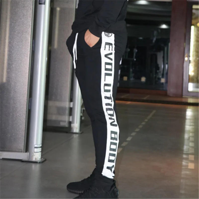 Новинка 2019 спортивные штаны для мужчин. однотонные бодибилдинга. повседневные