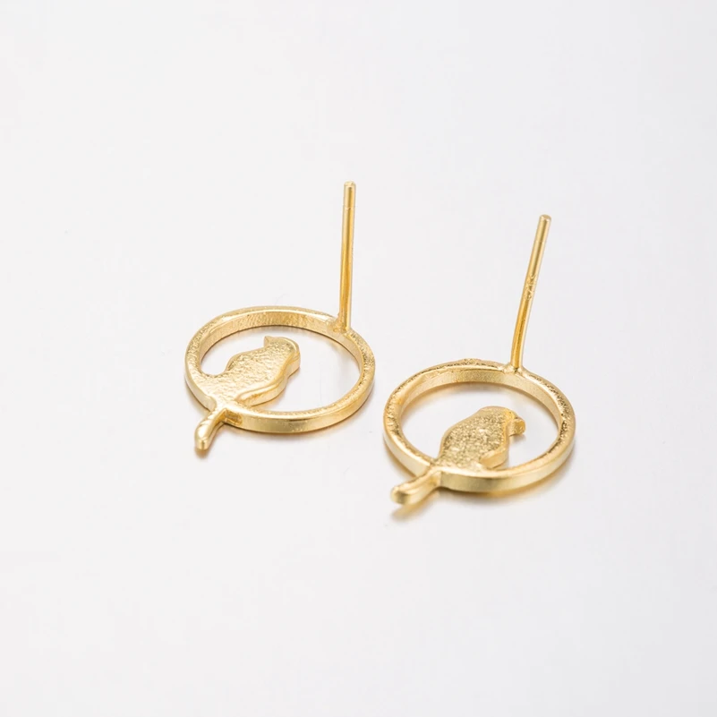 Женские серьги-гвоздики в виде ветки птицы |