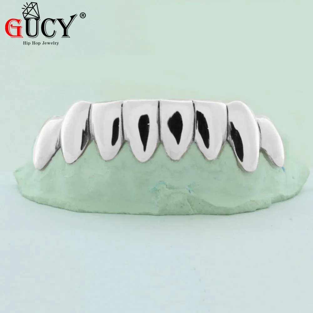 Gucy индивидуальный стиль хип хоп grillz Gold Цвет покрытием капельного Стиль зубы гриль в форме нижней части зуба грили подарок на Хэллоуин
