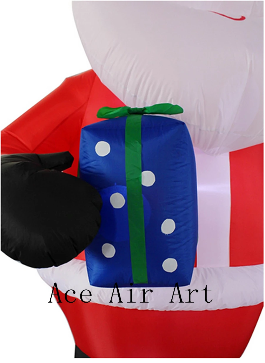 

DECORA Christmas Inflatable Santa Claus with Candy Cane Indoor Outdoor Yard Decoration