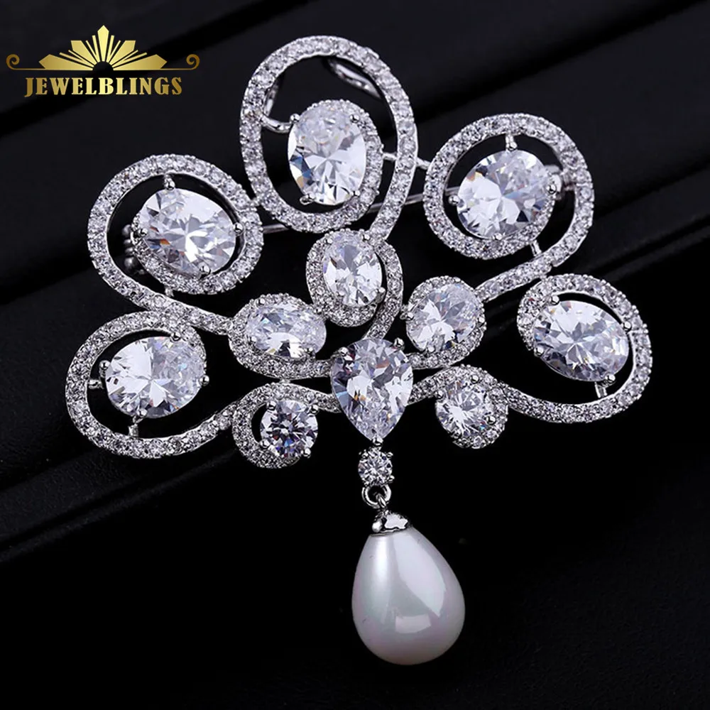 Великолепная открывающаяся овальная фианитовая закрепка с камнем белая