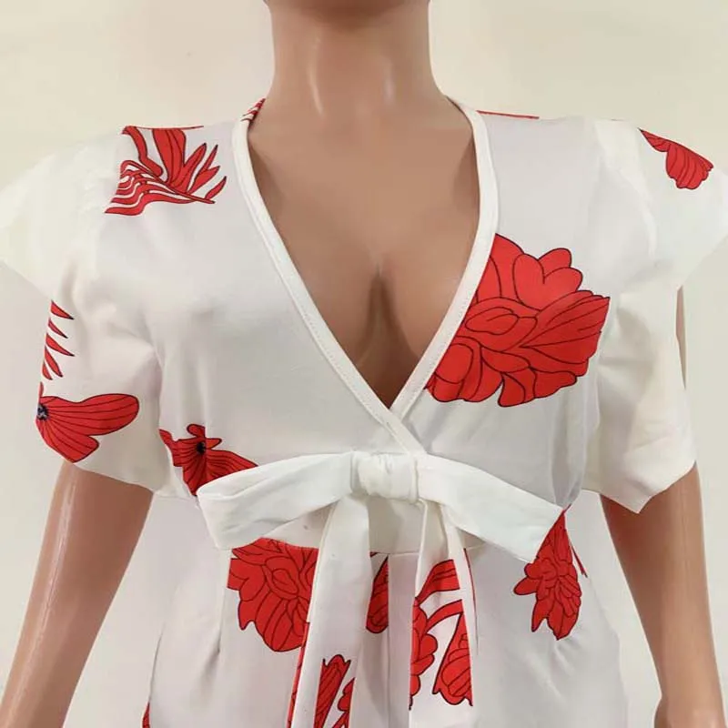 

Sexy Flower Printed Jumpsuit Women Rompers Bandage Deep V-Neck Ruffles Sleeve Bow Flare Pants White Bodysuit Boho Partyclub