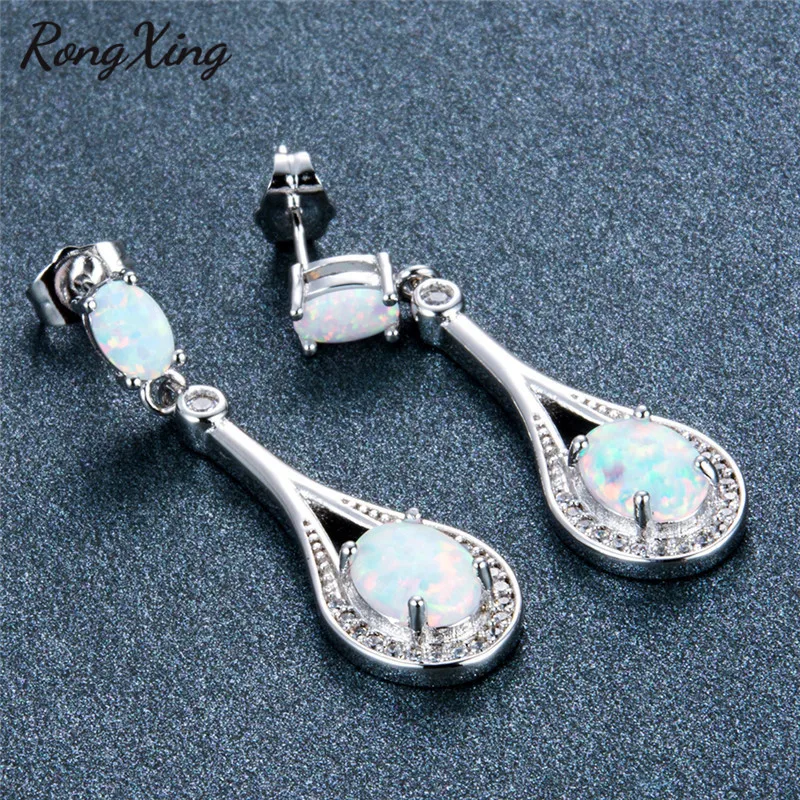 Женские серьги-подвески с овальным белым огненным опалом | Украшения и