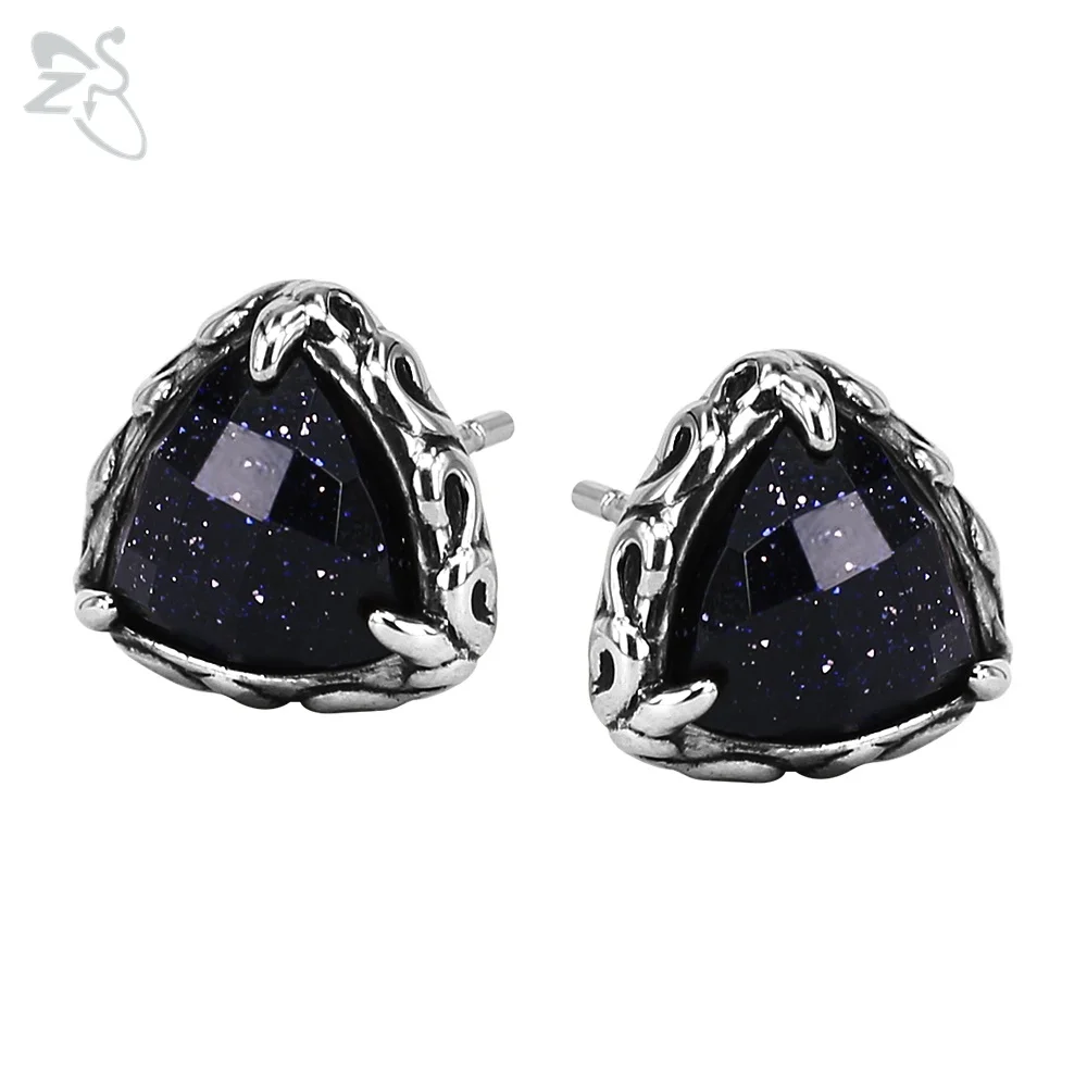 Серьги-гвоздики в виде темно-синих звезд с фианитом завитка ушной раковины