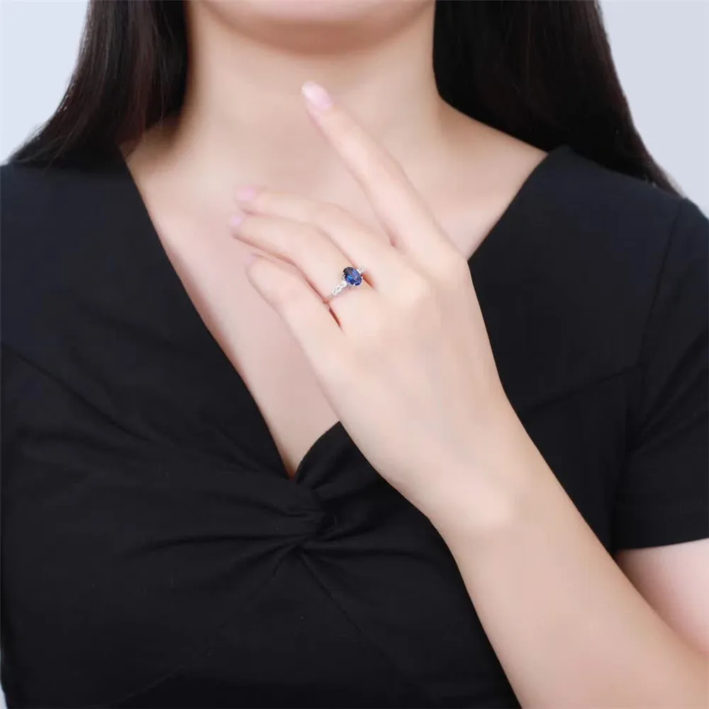 

fashionable 925 sterling silver oval shape natural blue topaz gemstone ring for women