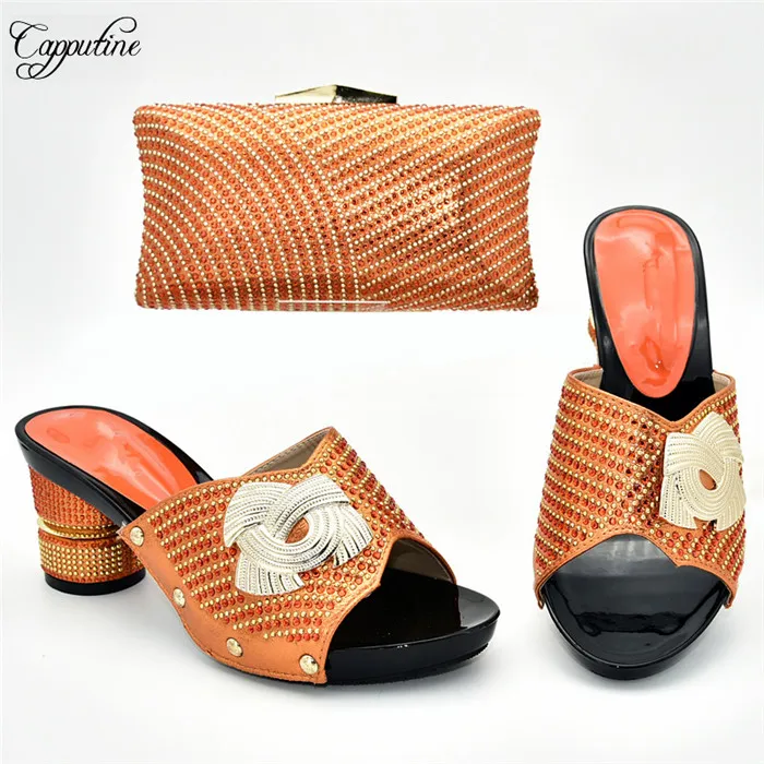 Самые популярные фиолетовые туфли лодочки и сумка в комплекте под вечернее