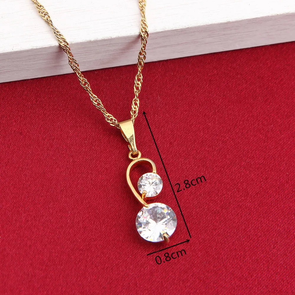 Комплект из колье и подвески золотистого цвета с африканскими кристаллами |