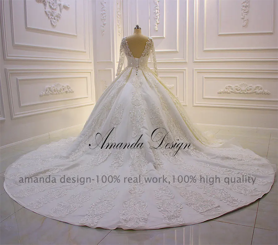 Свадебное платье с длинным рукавом и кружевной аппликацией Amanda Design abito da