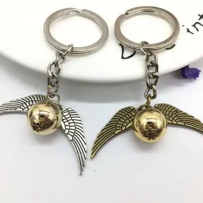 

Movie Jewelry Golden Snitch Pendent Keychain Vintage Style Angel Wing Charm Keychain For Men women Keyring