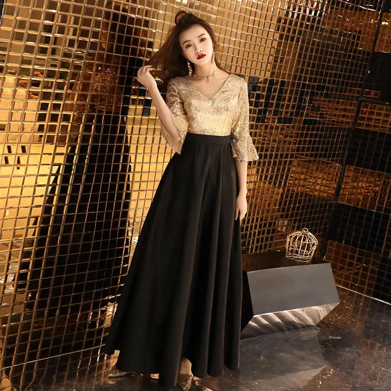 Женское длинное вечернее платье золотистое и черное с рукавами-пагоды 2019 |