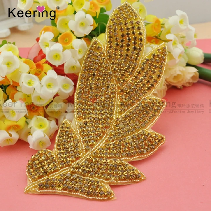 

Fancy Leaf Shape Gold Rhinestone Beaded Applique