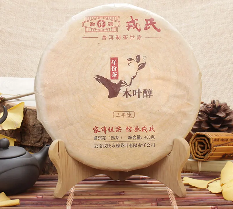 Mengku Rongshi Mu Ye Chun 3 года в возрасте спелый Pu-erh торт 400 г