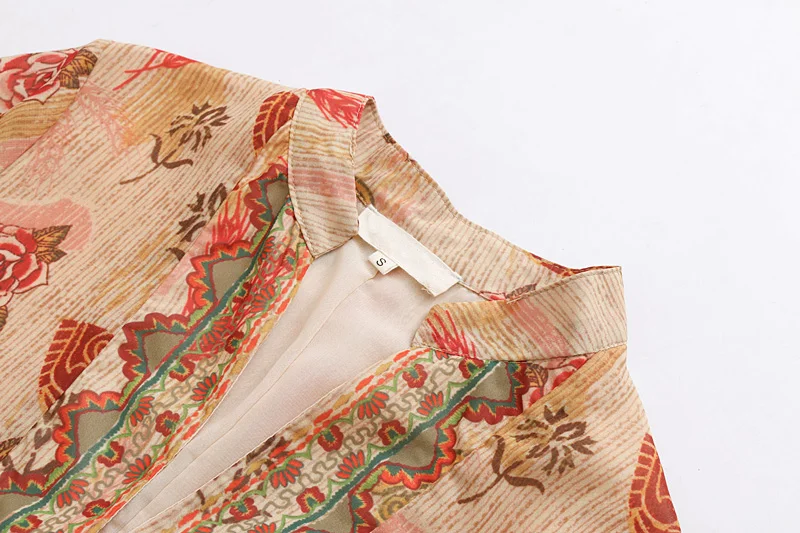 Винтажное платье с цветочным принтом и оборками платья v-образным вырезом