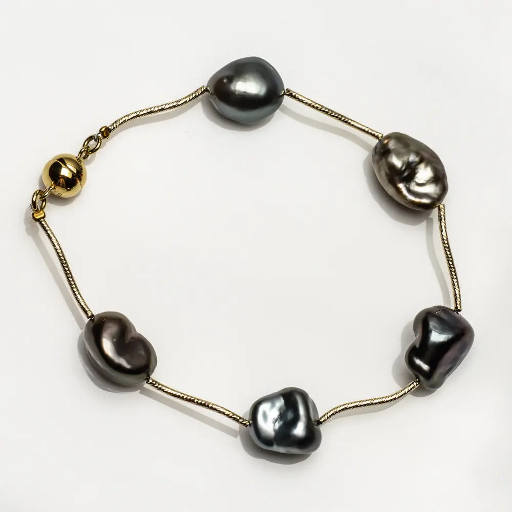 Браслет с искусственным жемчугом желтое золото 14 к магнитная застежка 11-12 мм 7 87