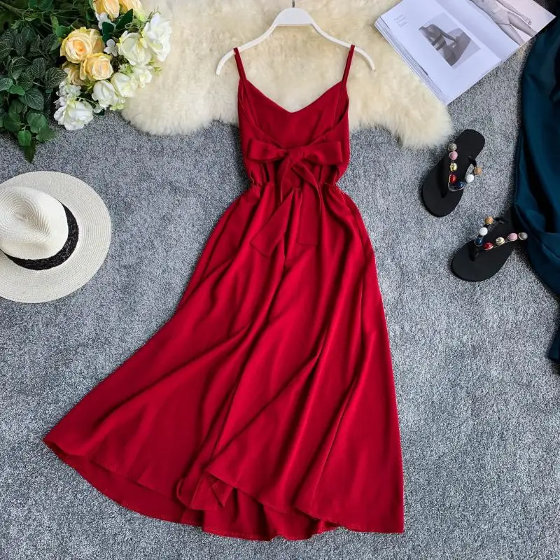 Женское пляжное платье с v-образным вырезом и бантом элегантное без рукавов