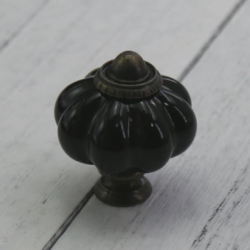 

Керамическая ручка для шкафа 33*38 мм тыквенная