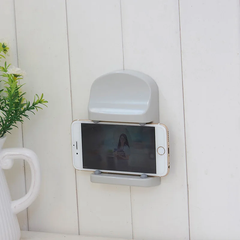 Сотовый телефон владельца паста вертикальные коробка ткани стеллаж полка