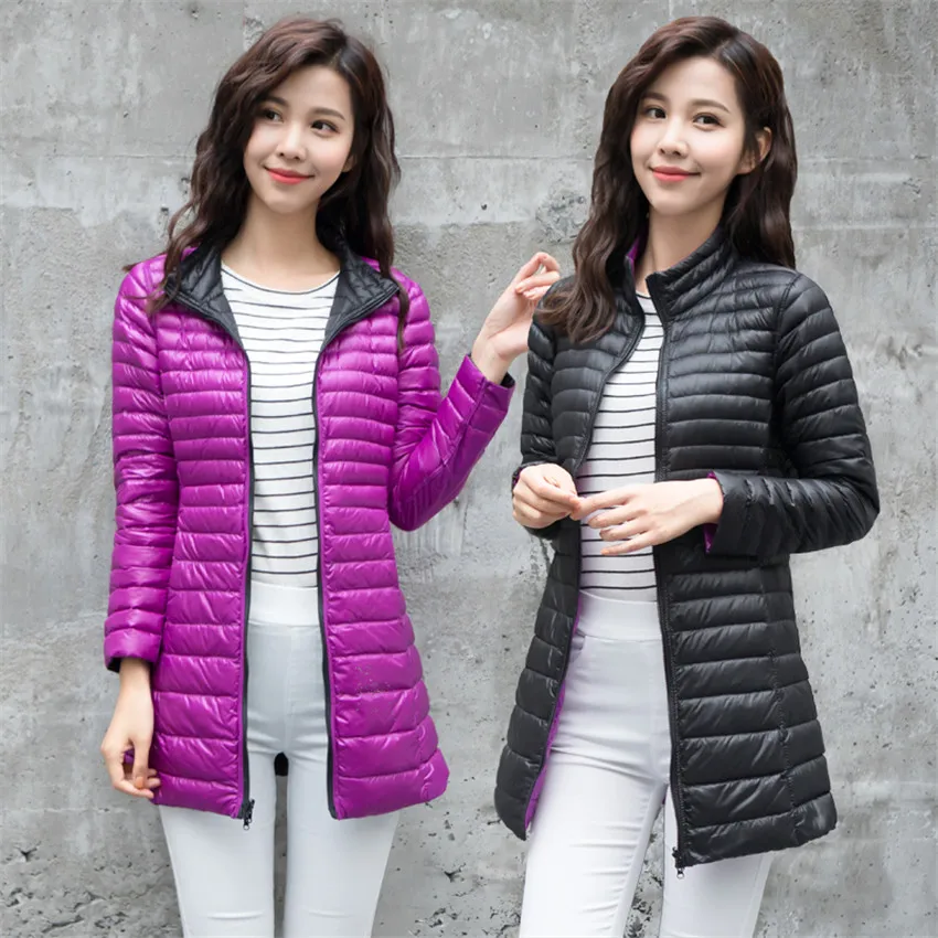 Женский пуховик средней длины с двухсторонним воротником тонкий белый стойкой