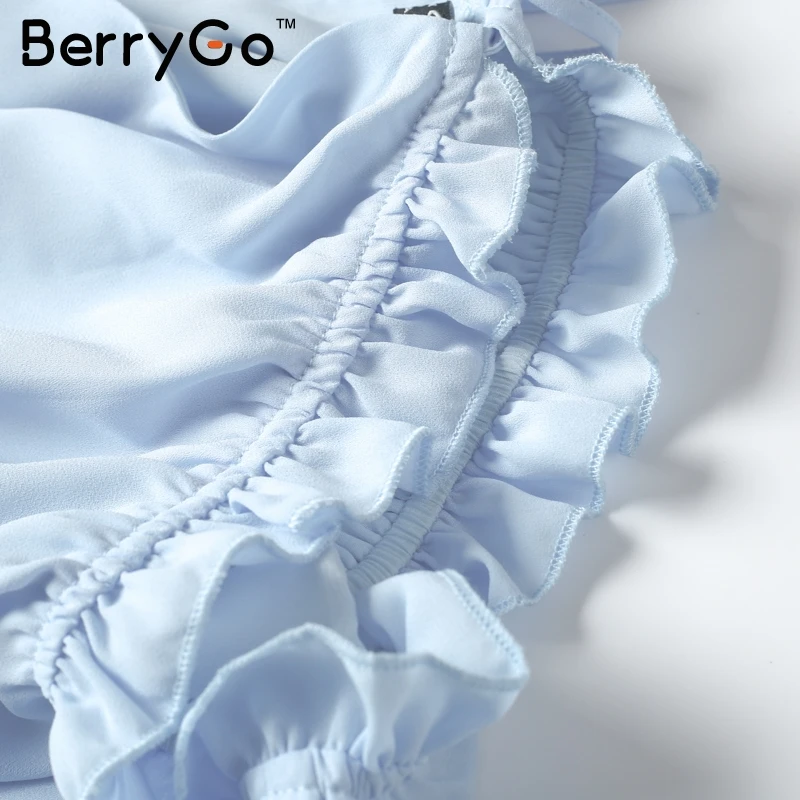 Женская шифоновая блузка с оборками BerryGo белая пляжная на шнуровке эластичный
