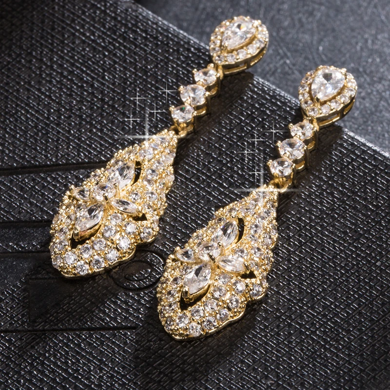 Привлекательные серьги подвески из розового золота с белым цирконием для женщин